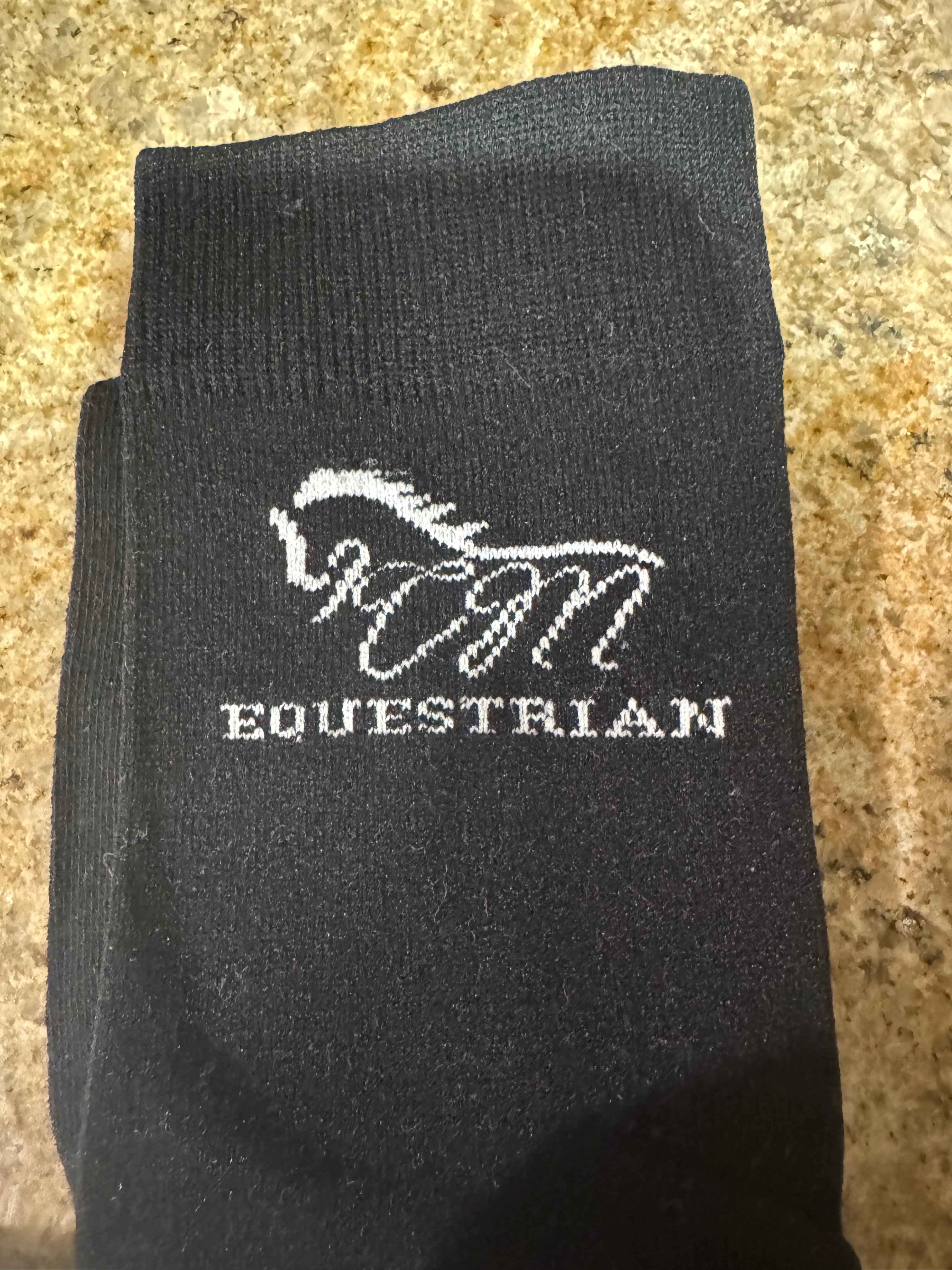 CM equestrian logo socks in black with White logo on the side.